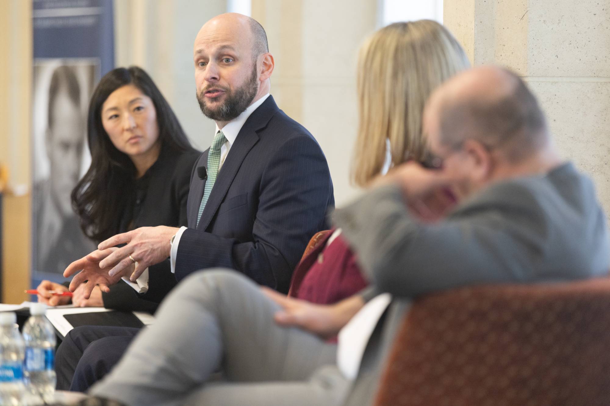 person speaking at a podium
